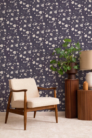 Mitchell Black Floral Bliss Abstract Wallpaper in shade Currant chair at Say Decor