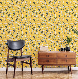 Mitchell Black Floral Bliss Abstract Wallpaper in shade Saffron sitting room at Say Decor