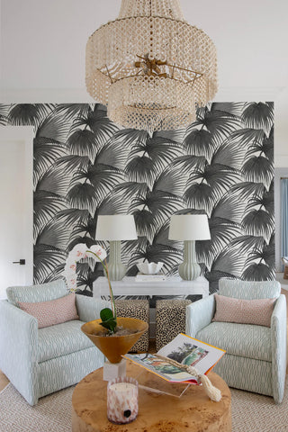 Mitchell Black x Megan Molten Pawley’s Island Palms Botanical Wallpaper living room in shade Black at Say Decor