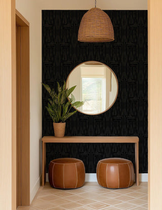 Mitchell Black Chiseled Geometric Wallpaper entryway in shade Midnight at Say Decor