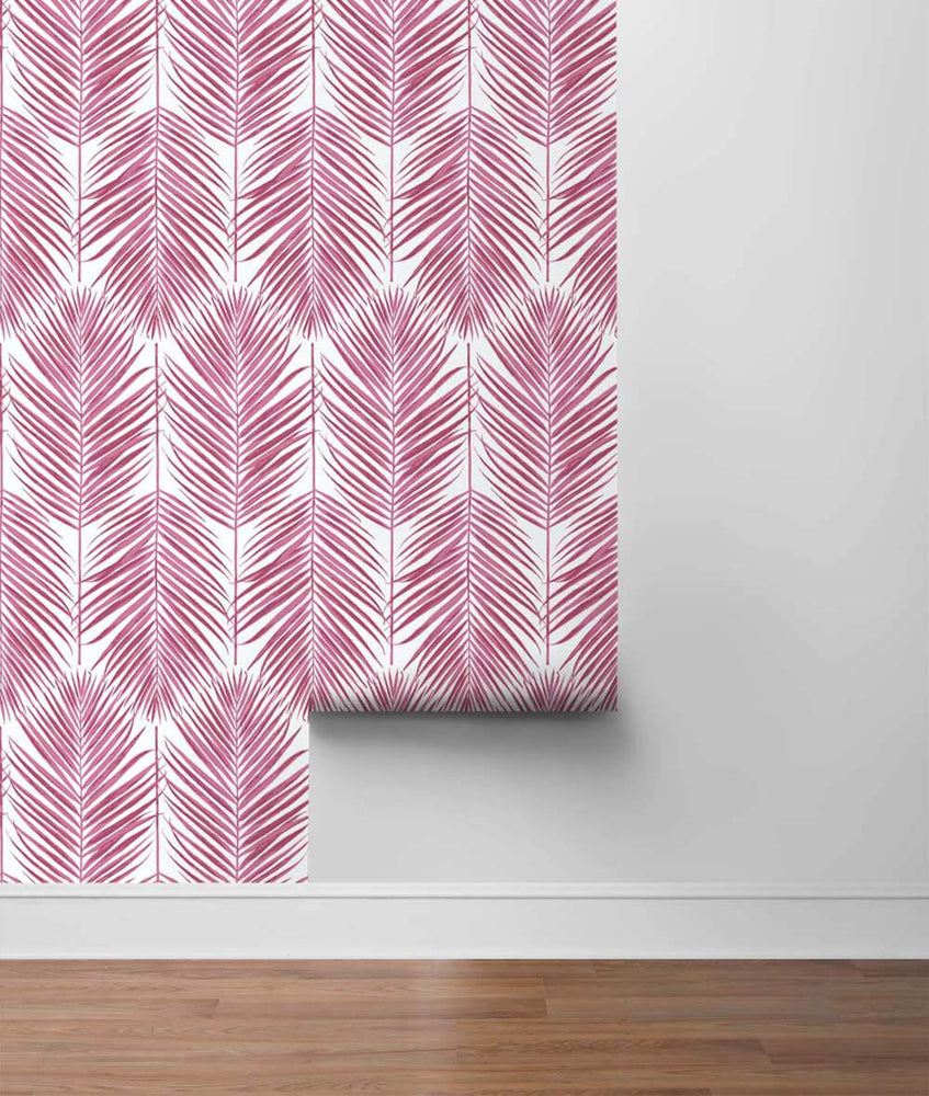 NW33001 cerise pink palm leaf peel and stick removable wallpaper roll by NextWall