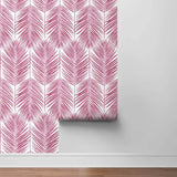 NW33001 cerise pink palm leaf peel and stick removable wallpaper roll by NextWall