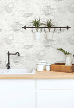 NW37800 stuccoed faux brick peel ands stick removable wallpaper backsplash from NextWall