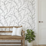 NW39000 delicate branches botanical peel and stick removable wallpaper entryway from NextWall