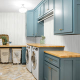 NW39900 wood panel faux peel and stick wallpaper laundry room from NextWall