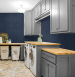 NW39902 wood panel faux peel and stick wallpaper laundry room from NextWall